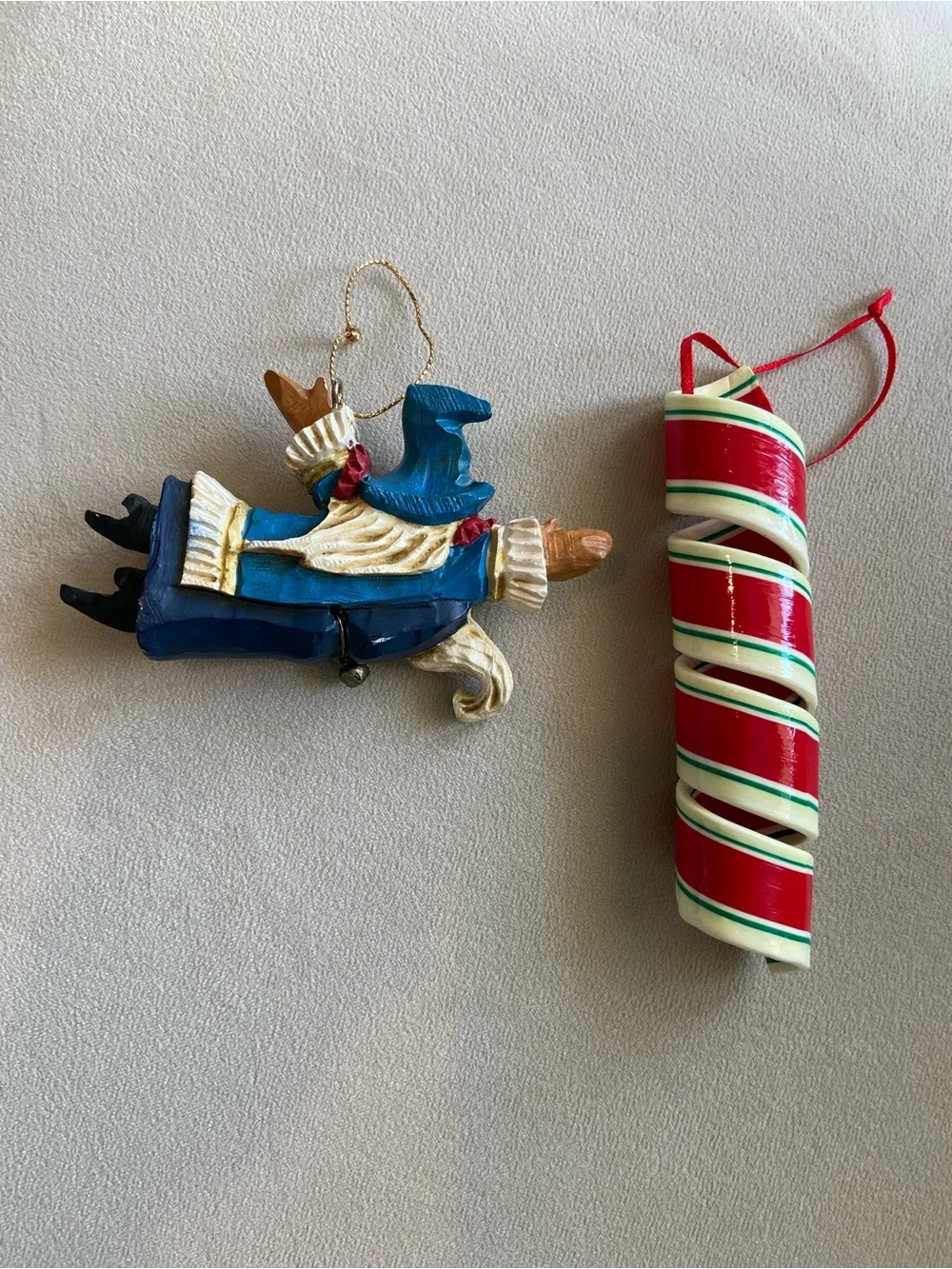2 mismatched christmas holiday ornaments